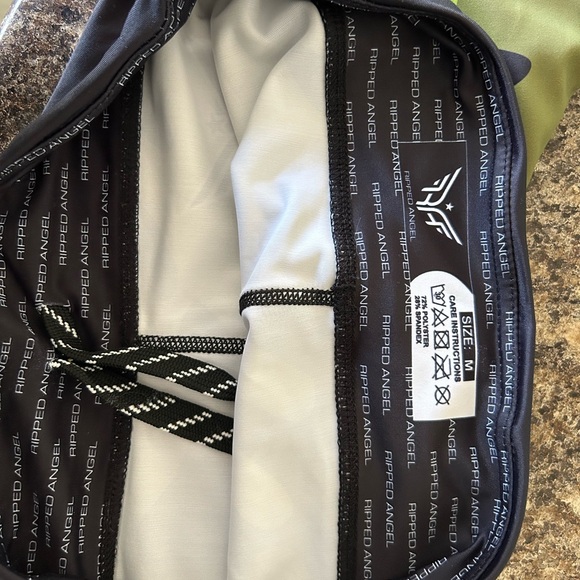 Ripped angel camo tights . Great stretch and has drawstring at waist.full length - Picture 3 of 4